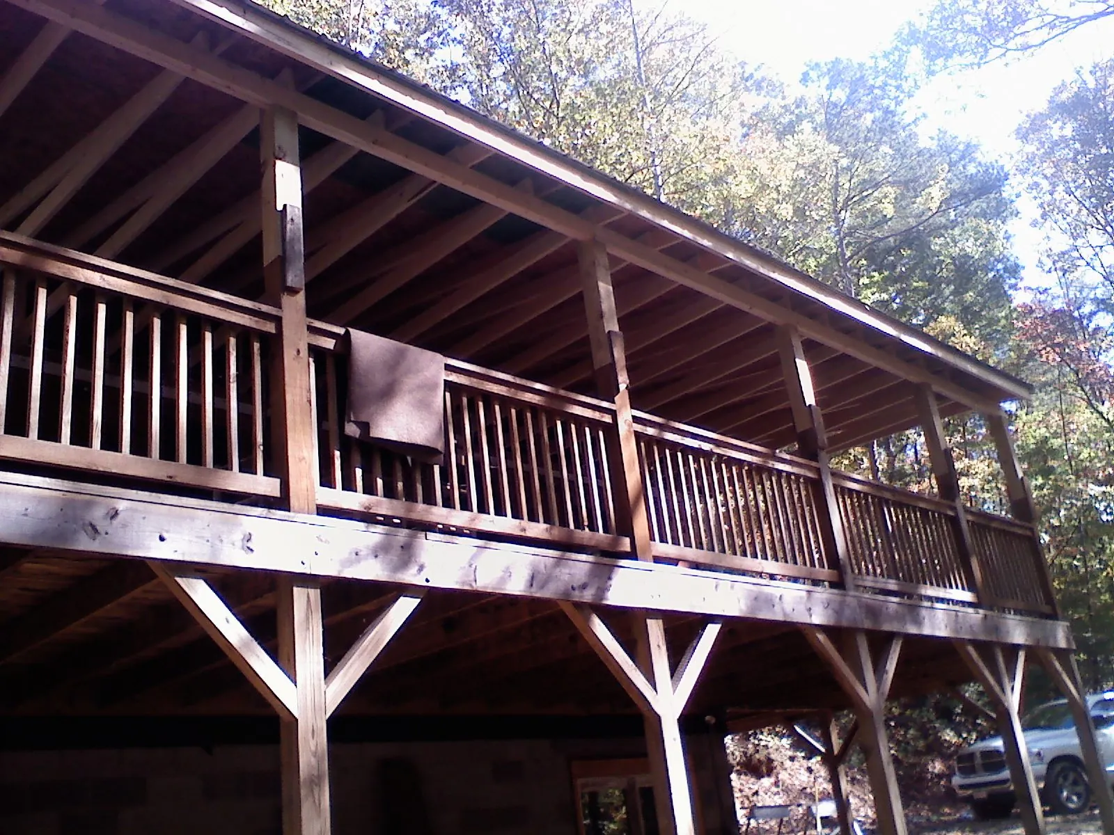 Timber framing under a new elevated porch and deck — Roof Leak Repair in Lewiston Woodville by Roofing Brothers